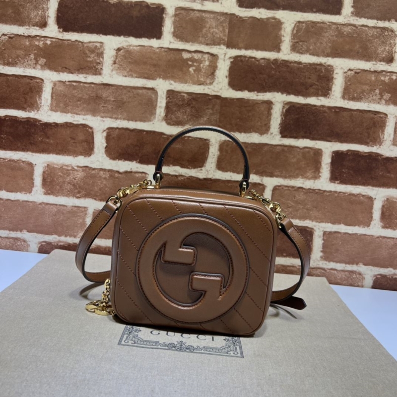 G*u*i top handle bags